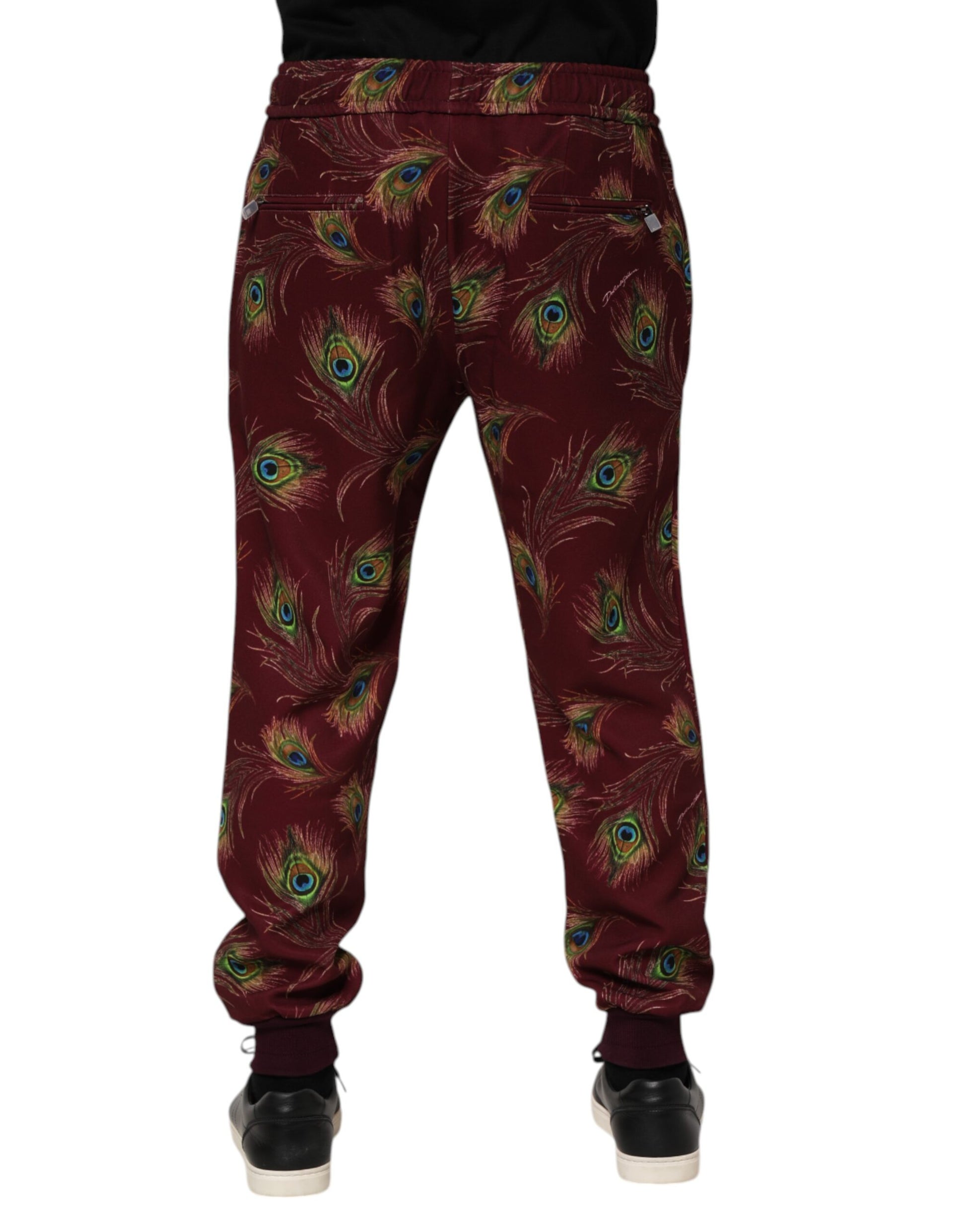 Pair of pants with peacock print pattern