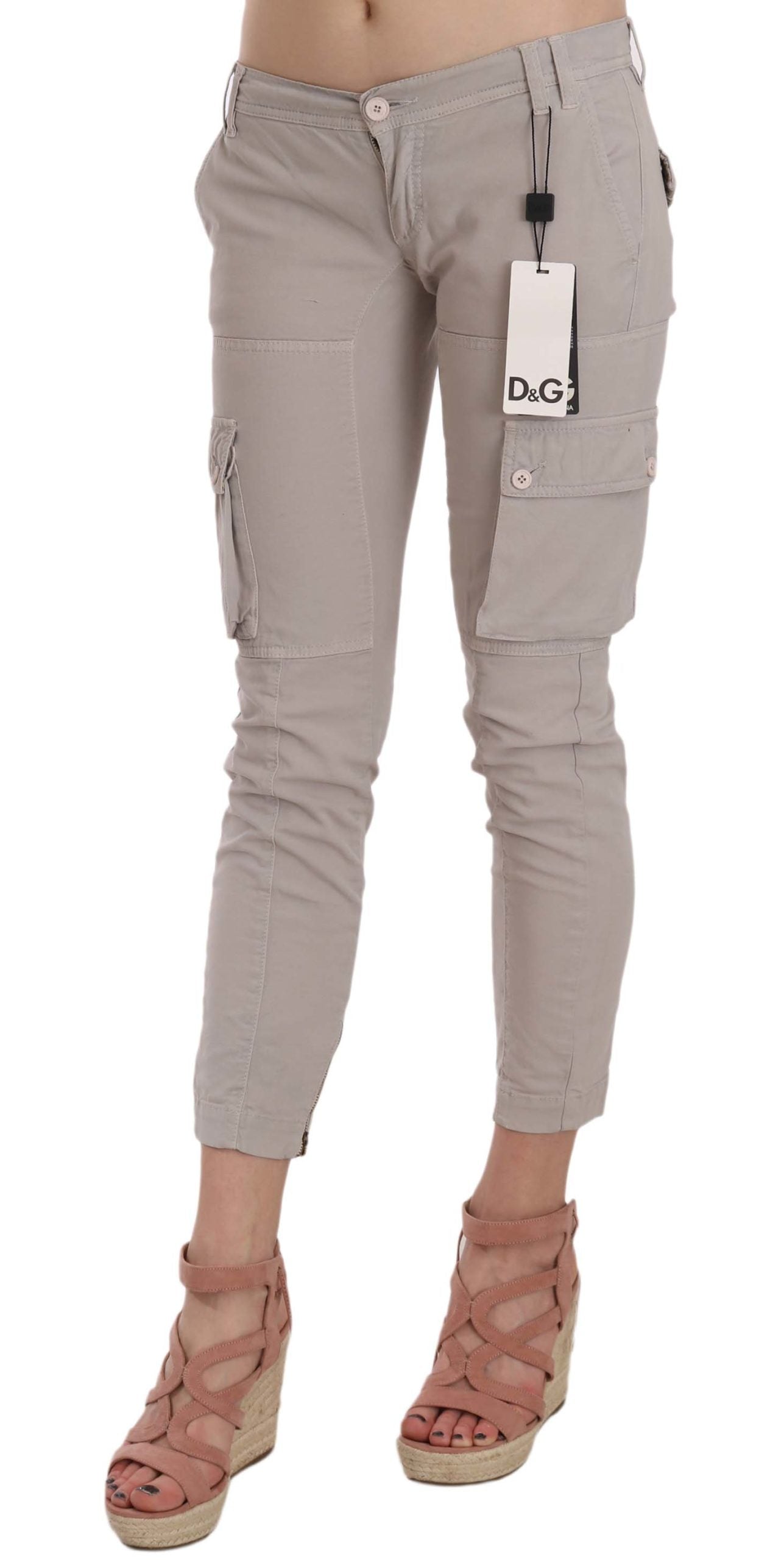 Pair of light grey denim jeans with distressed details and cargo pockets