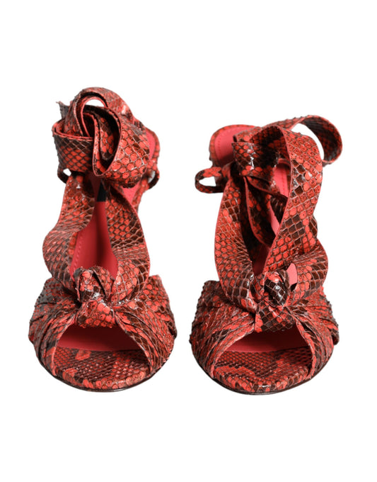 Red high heel shoes with snake skin texture