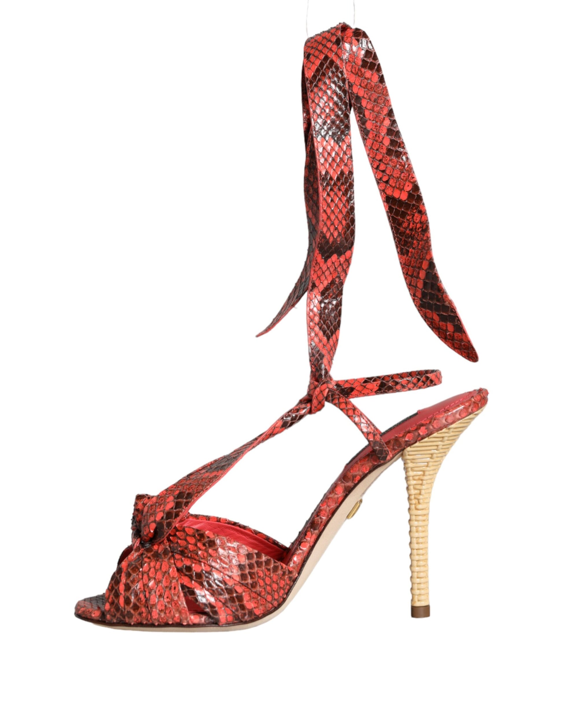 High heel shoe with red snake print design