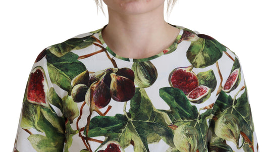 Woman wearing a long sleeve shirt with a fruit print design