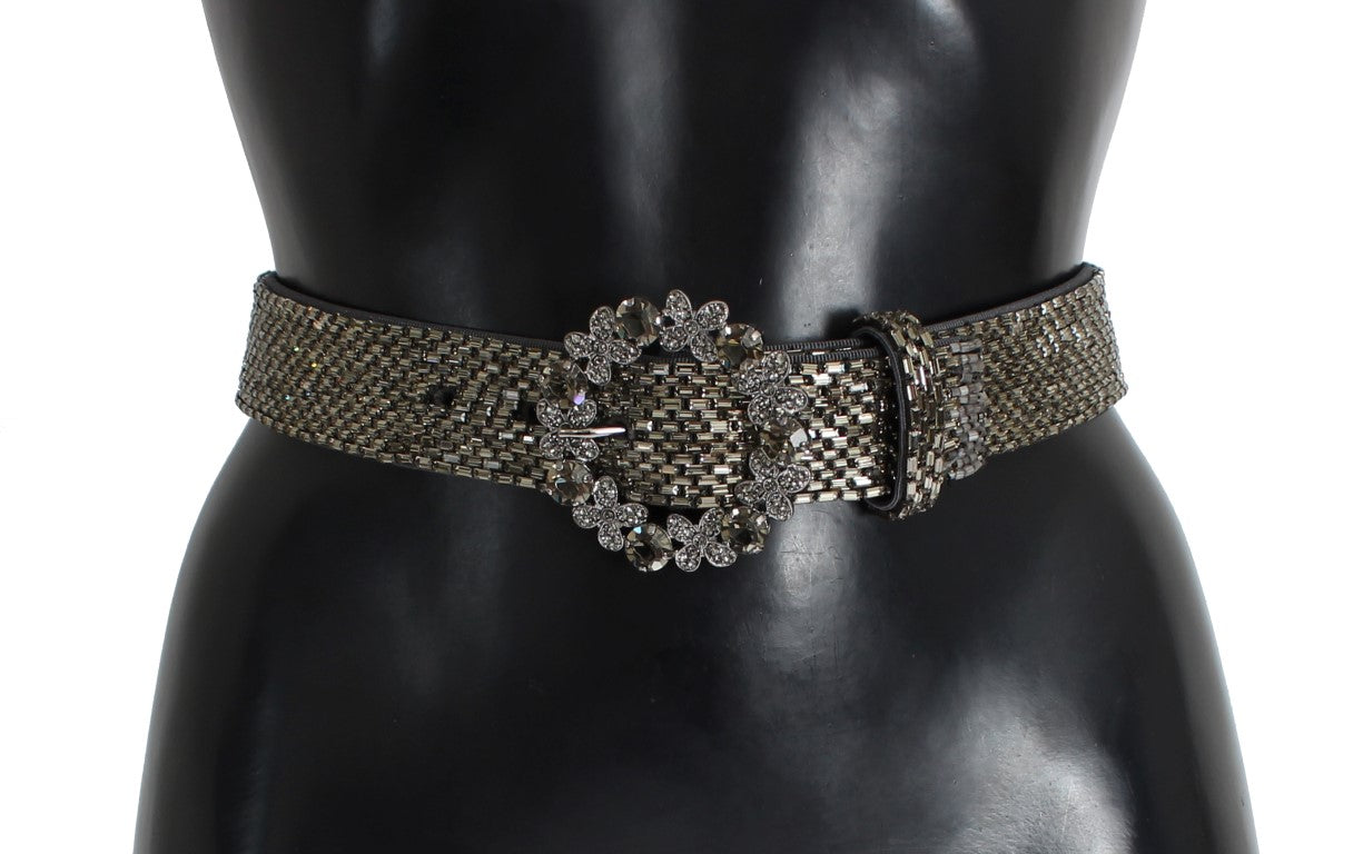 Silver belt with embellishments on a mannequin torso