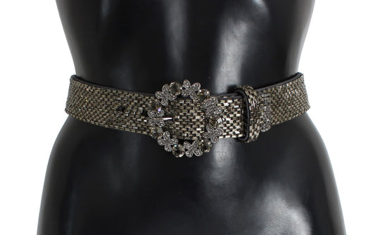 Silver belt with embellishments on a mannequin torso