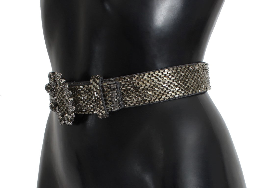 Shiny belt with embellishments on a mannequin torso