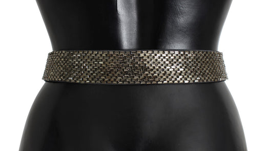 Shiny belt around black mannequin torso