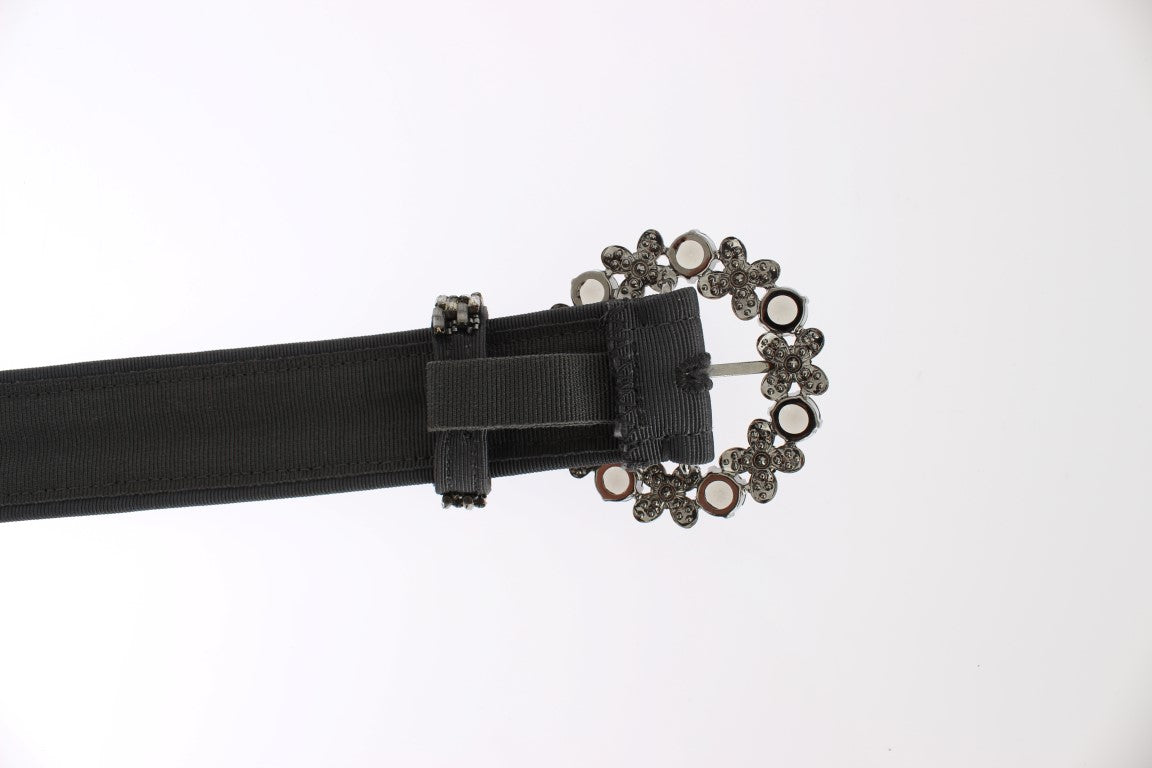 Black belt with silver buckle and decorative rings