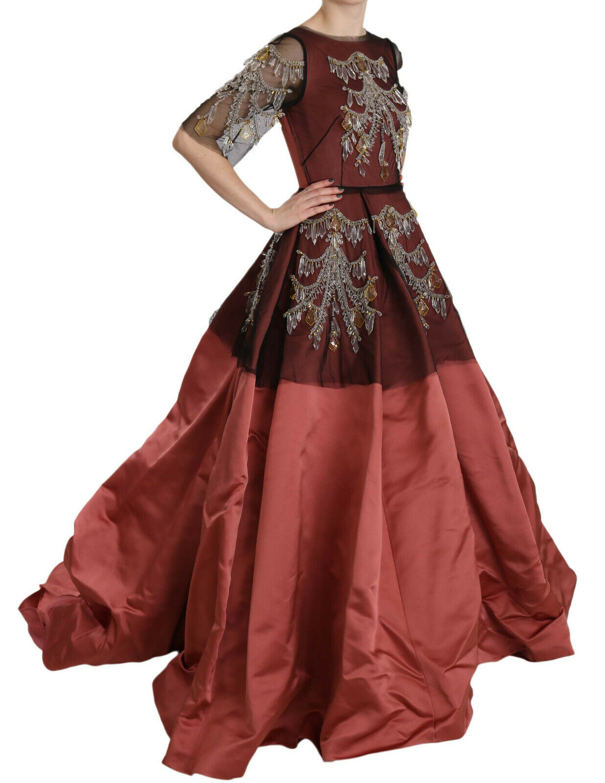 A red chandelier dress with intricate crystal embroidery and a flowing silk skirt