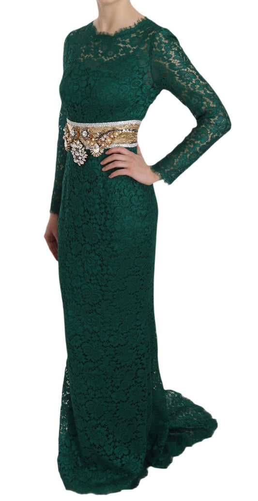 A long green dress with a gold belt and lace detailing