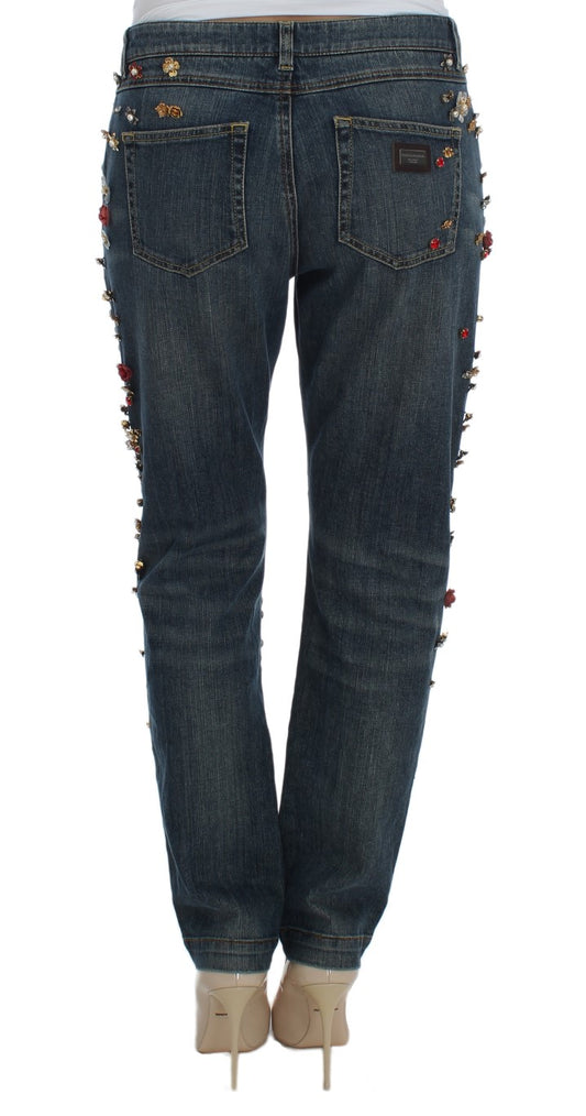 Pair of women's jeans with embellishments on legs and back pockets