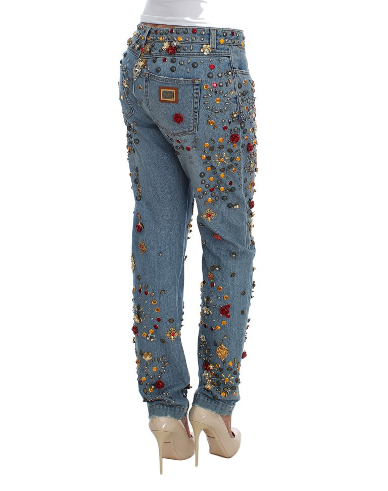 Pair of jeans with floral embroidery on legs and waistband