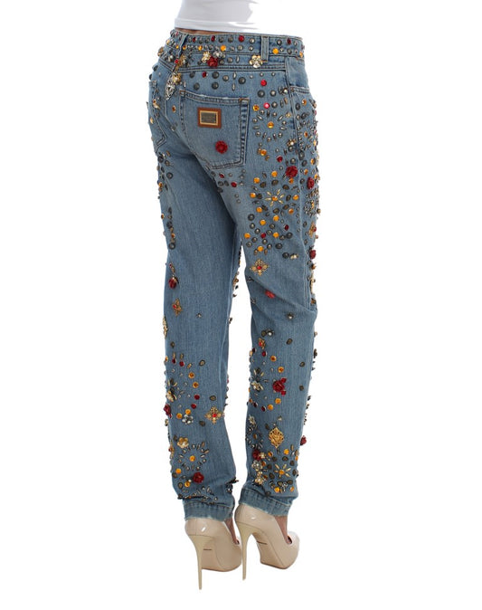 Pair of jeans with floral embroidery on legs and waistband