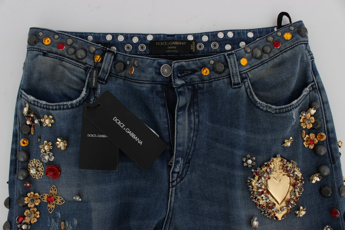 Blue denim shorts with embellishments and a tag