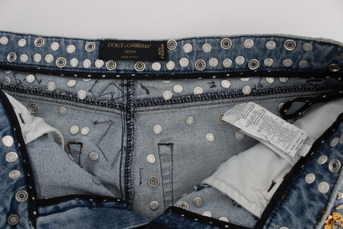 Blue denim jeans with silver studs and a tag inside