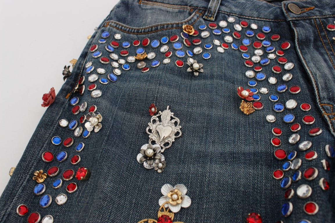 Decorative denim jeans with various embellishments including buttons and sequins