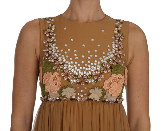 Brown dress with gold sequins, pink flowers and green leaves on bodice