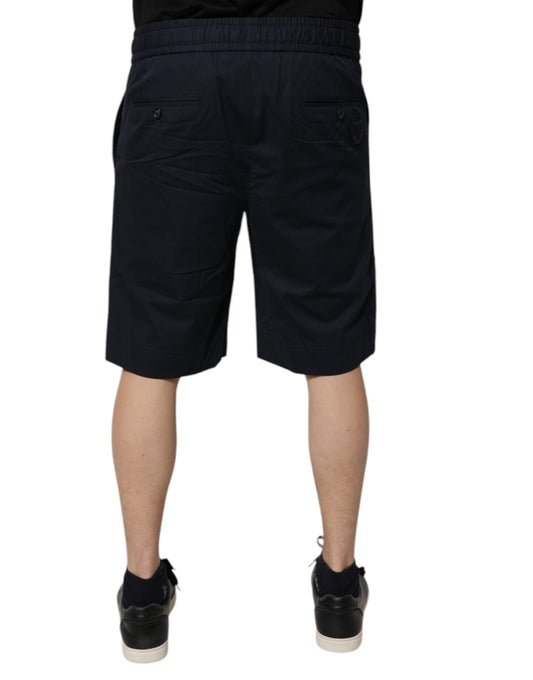 A pair of dark blue cotton bermuda shorts from the brand Dolce & Gabbana. They are designed as activewear and