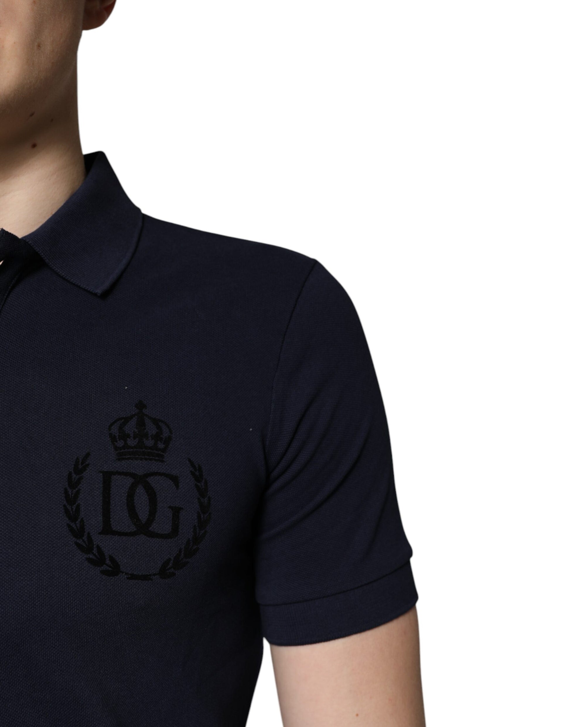 Navy polo shirt with embroidered logo on left chest