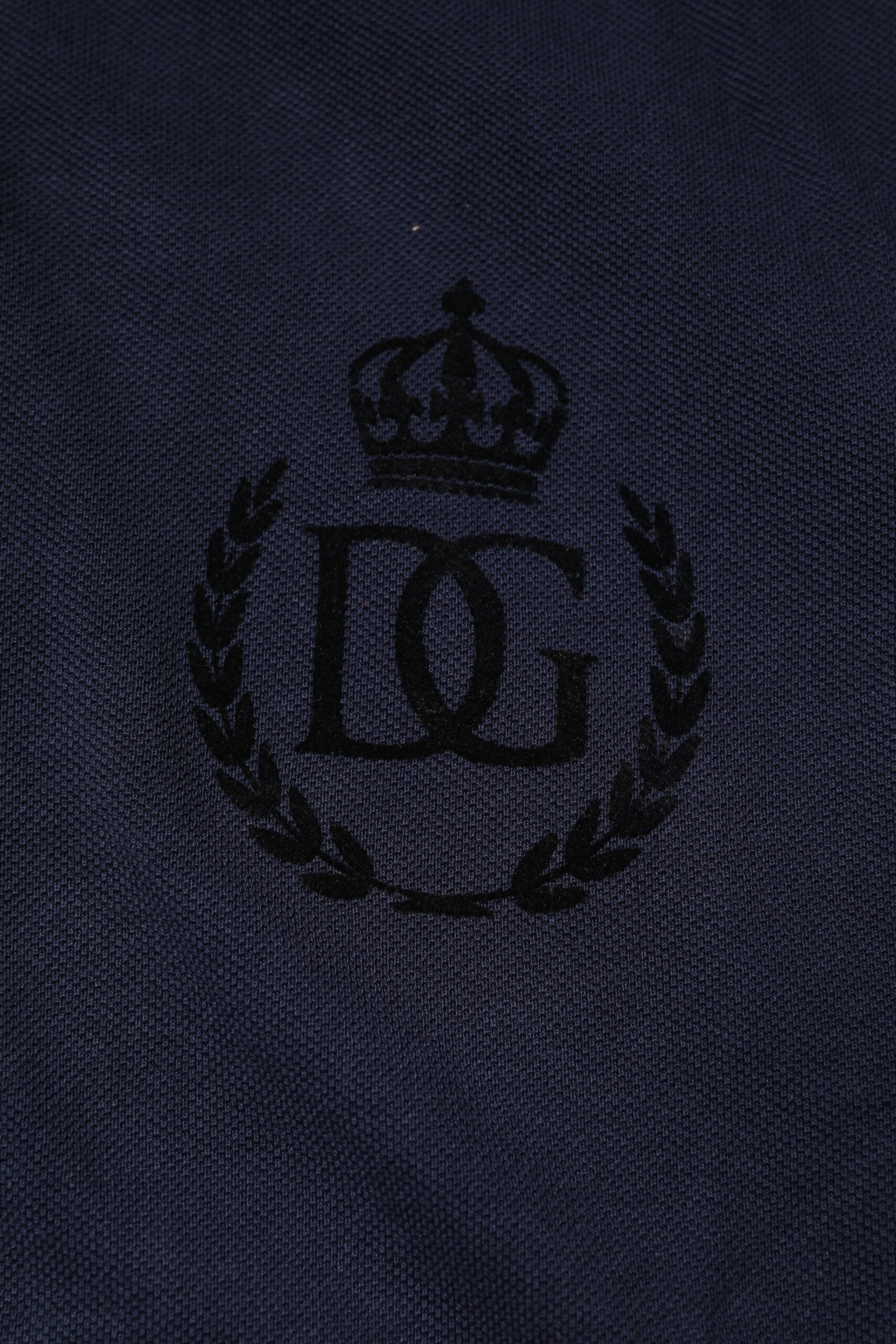 Navy blue fabric with embroidered logo