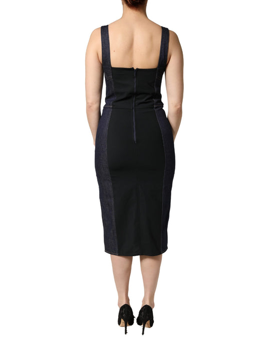 A dark blue denim sheath midi dress with a fitted bodice and flared skirt