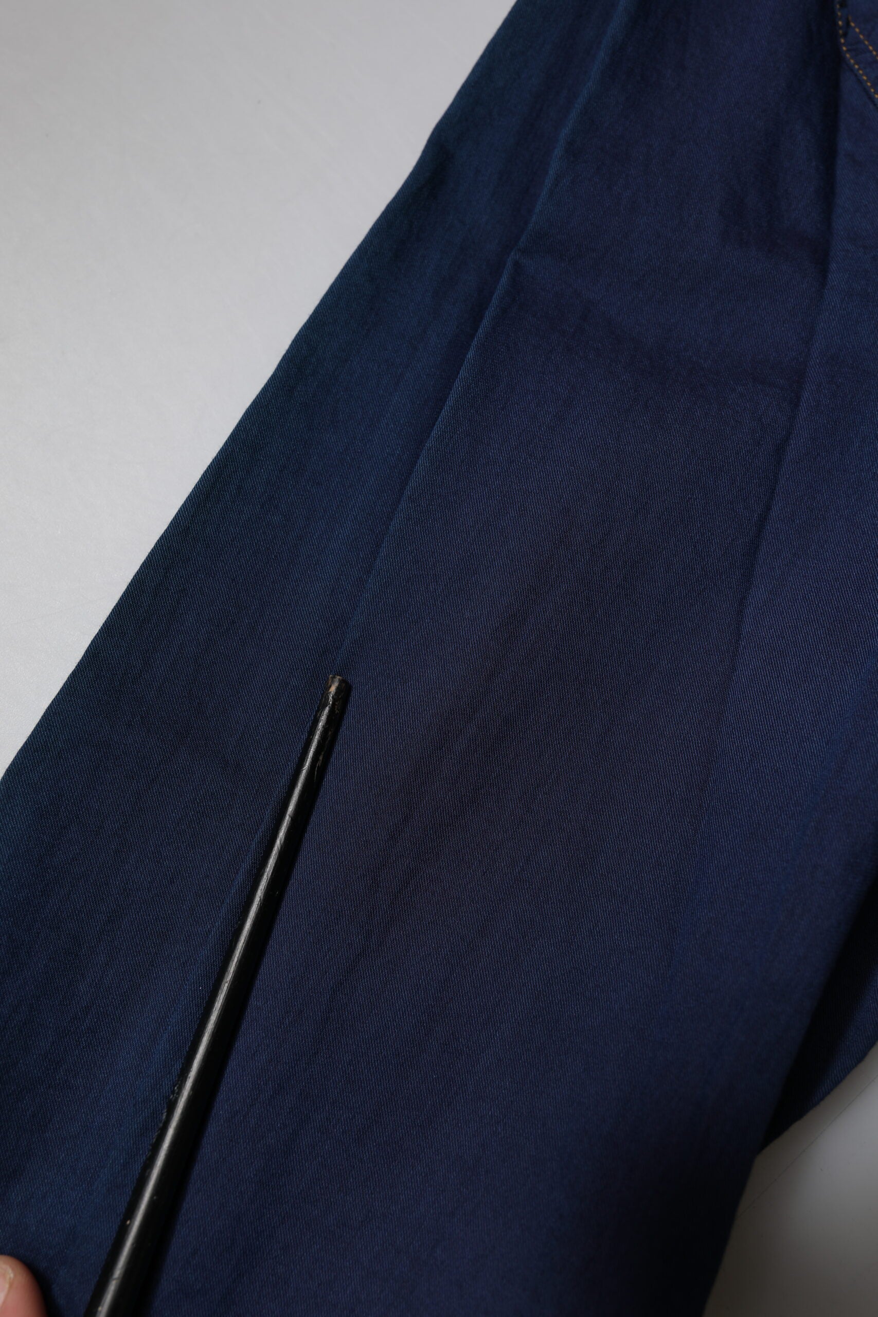 A dark blue cotton dress shirt with a gold design, part of the formal wear collection by Dolce & Gabbana