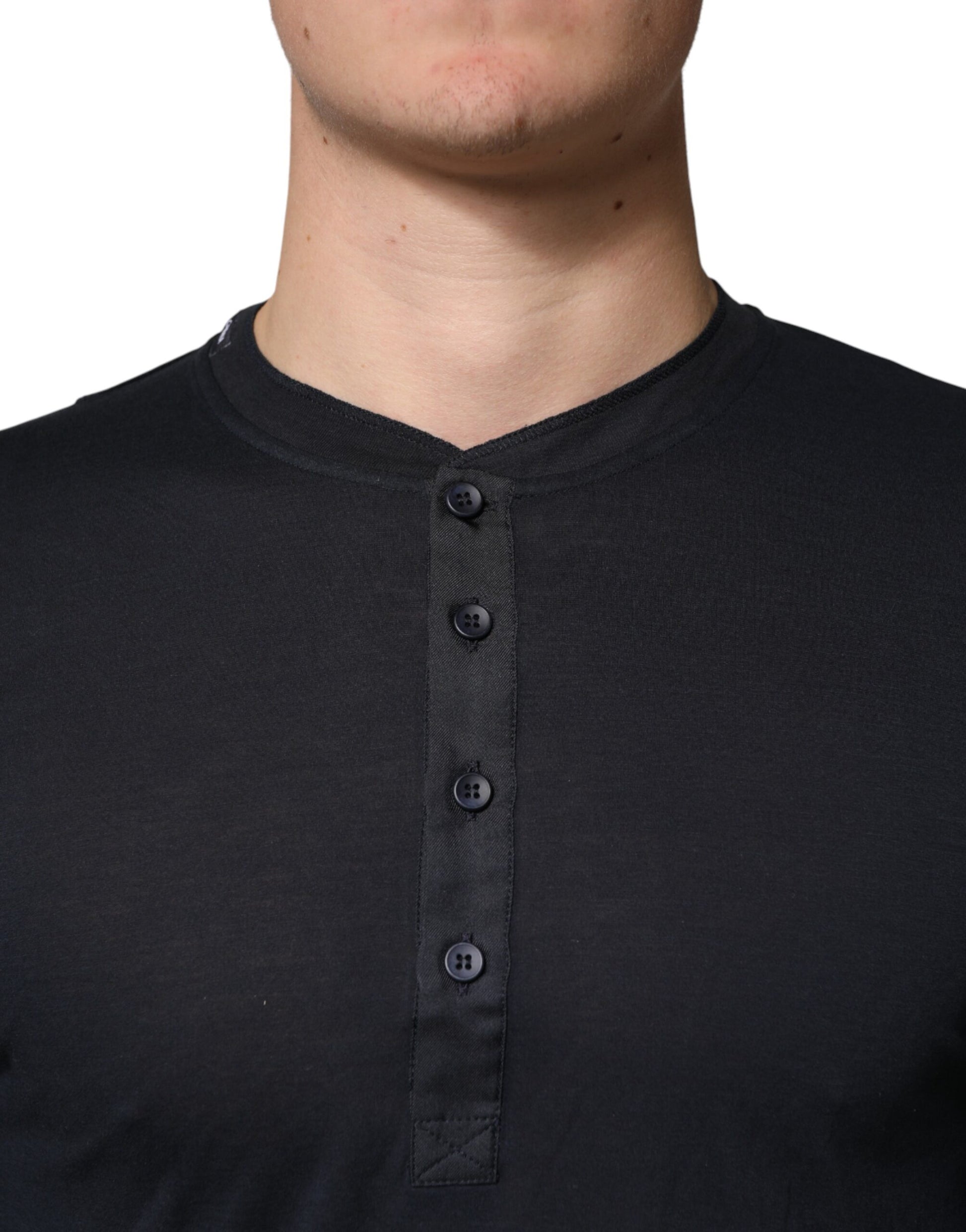 Man wearing dark colored sweater with zipper