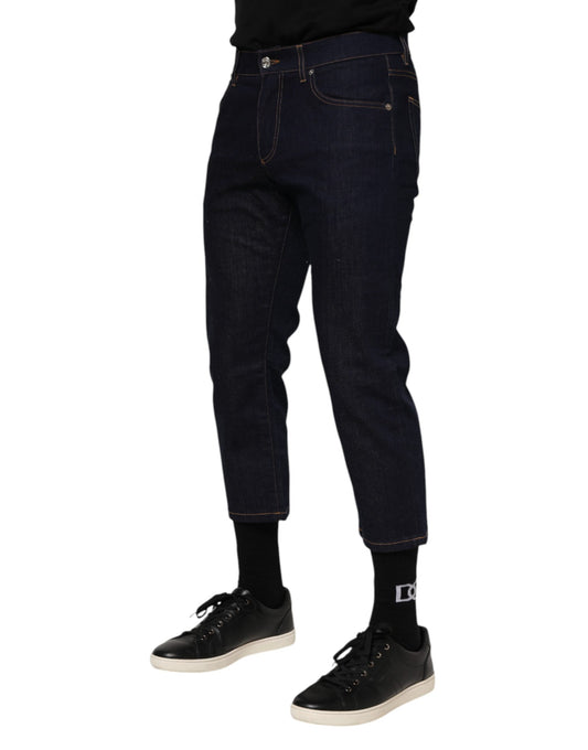 Pair of blue jeans with rolled up legs