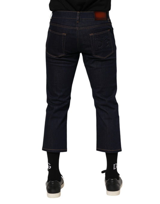 Pair of blue jeans with rolled up legs