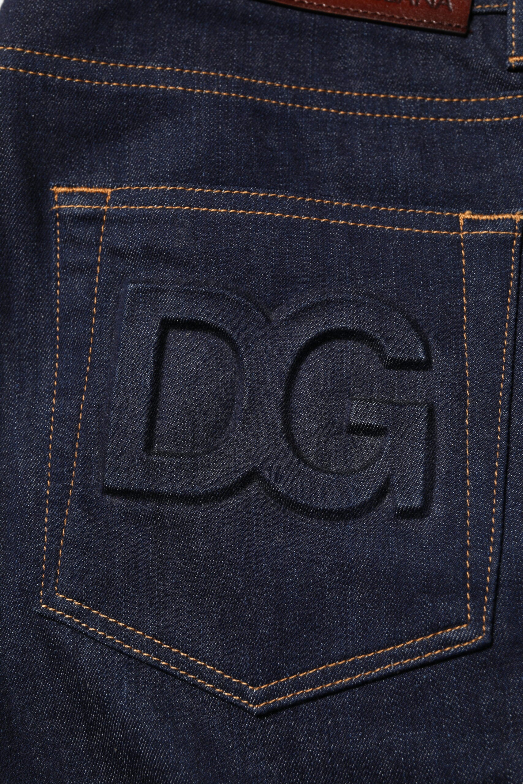 Blue denim jeans with embroidered logo on back pocket