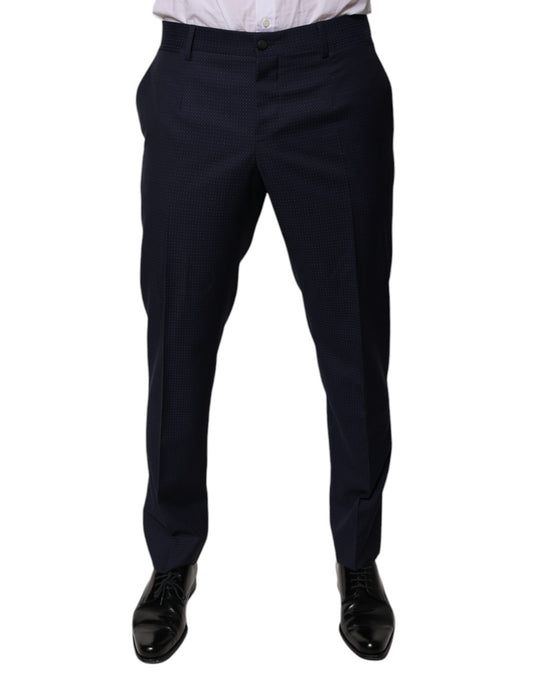 Pair of dark blue dress pants with white polka dots
