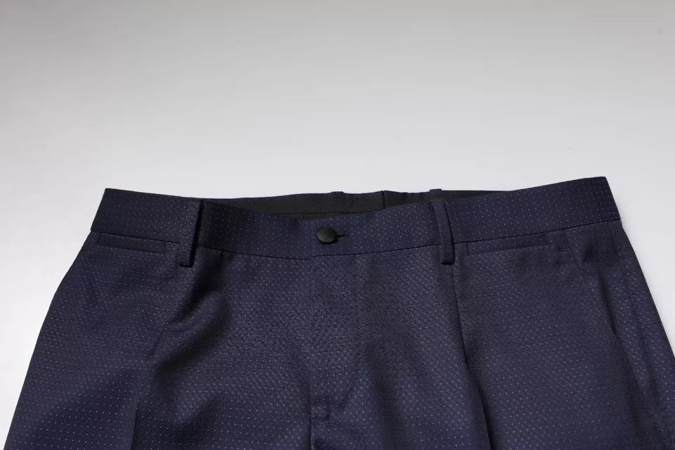 Pair of dark blue trousers with a subtle pattern