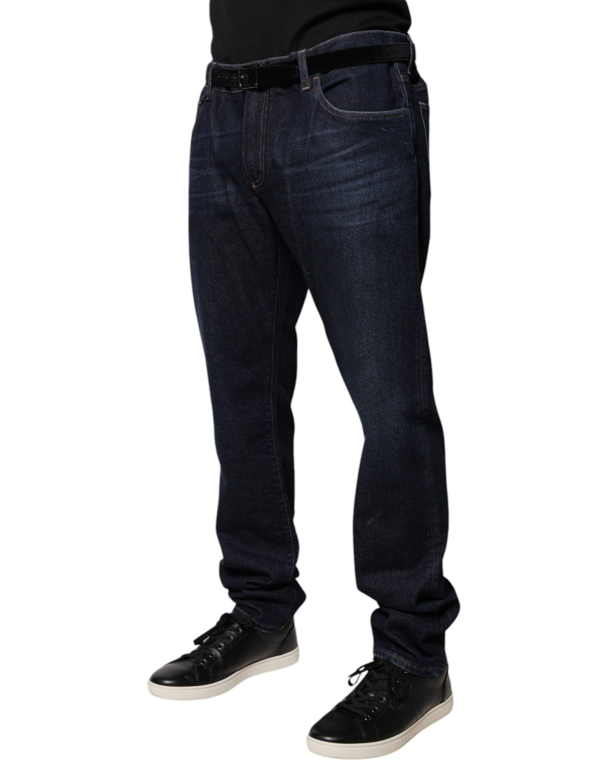 Man wearing blue jeans and black shoes