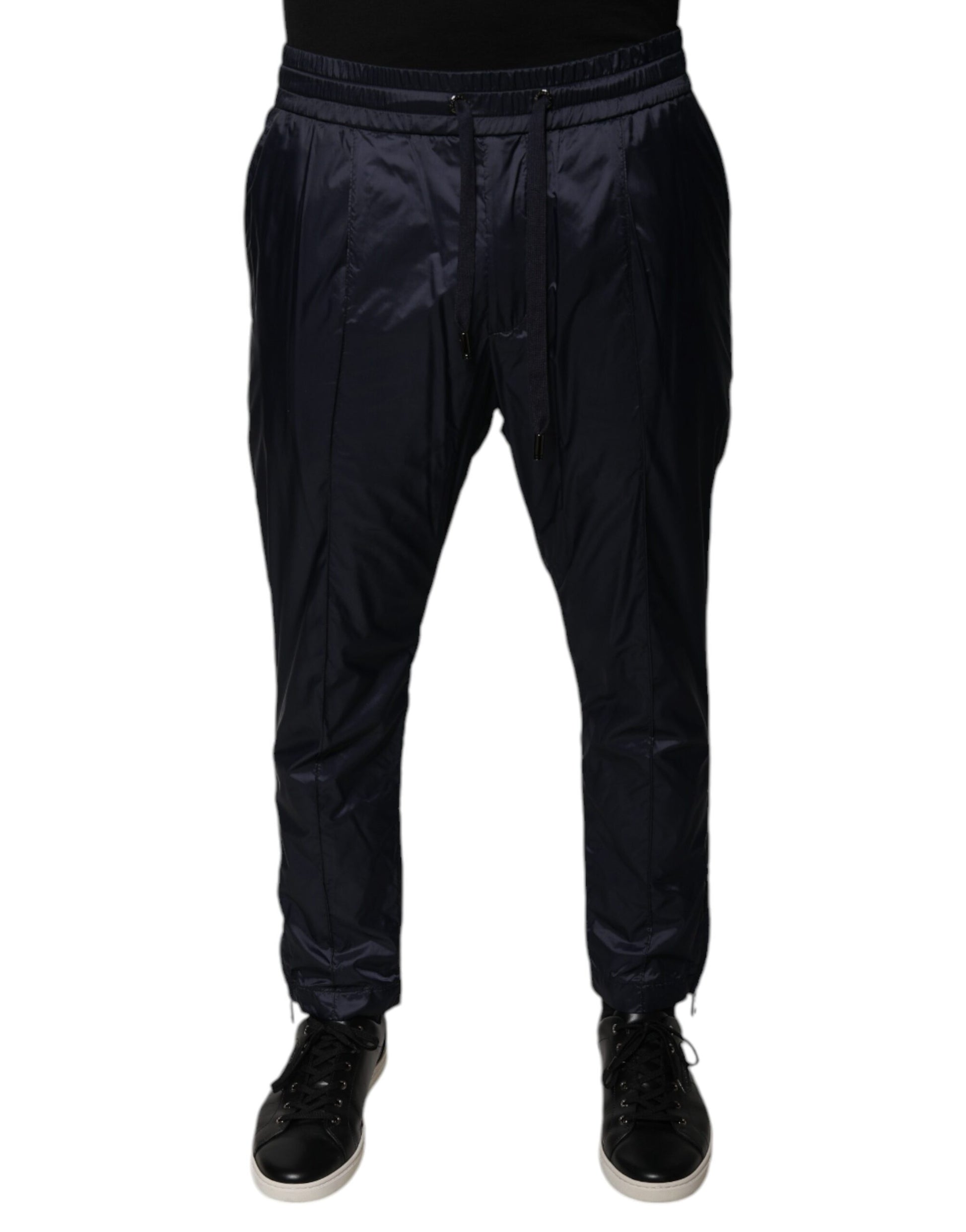 Pair of navy blue sweatpants with pockets on sides