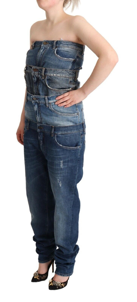 A woman wearing a denim jumpsuit dress with no sleeves
