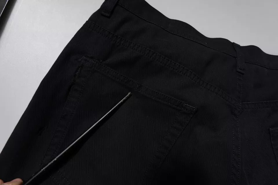 Pair of black jeans on a table
