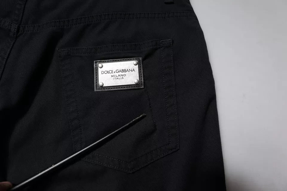 Black pants with a label on the left side