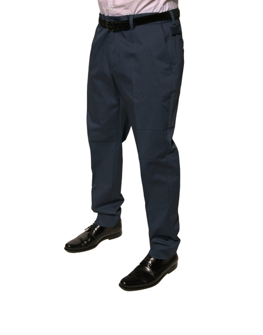 Man wearing blue pants and black shoes