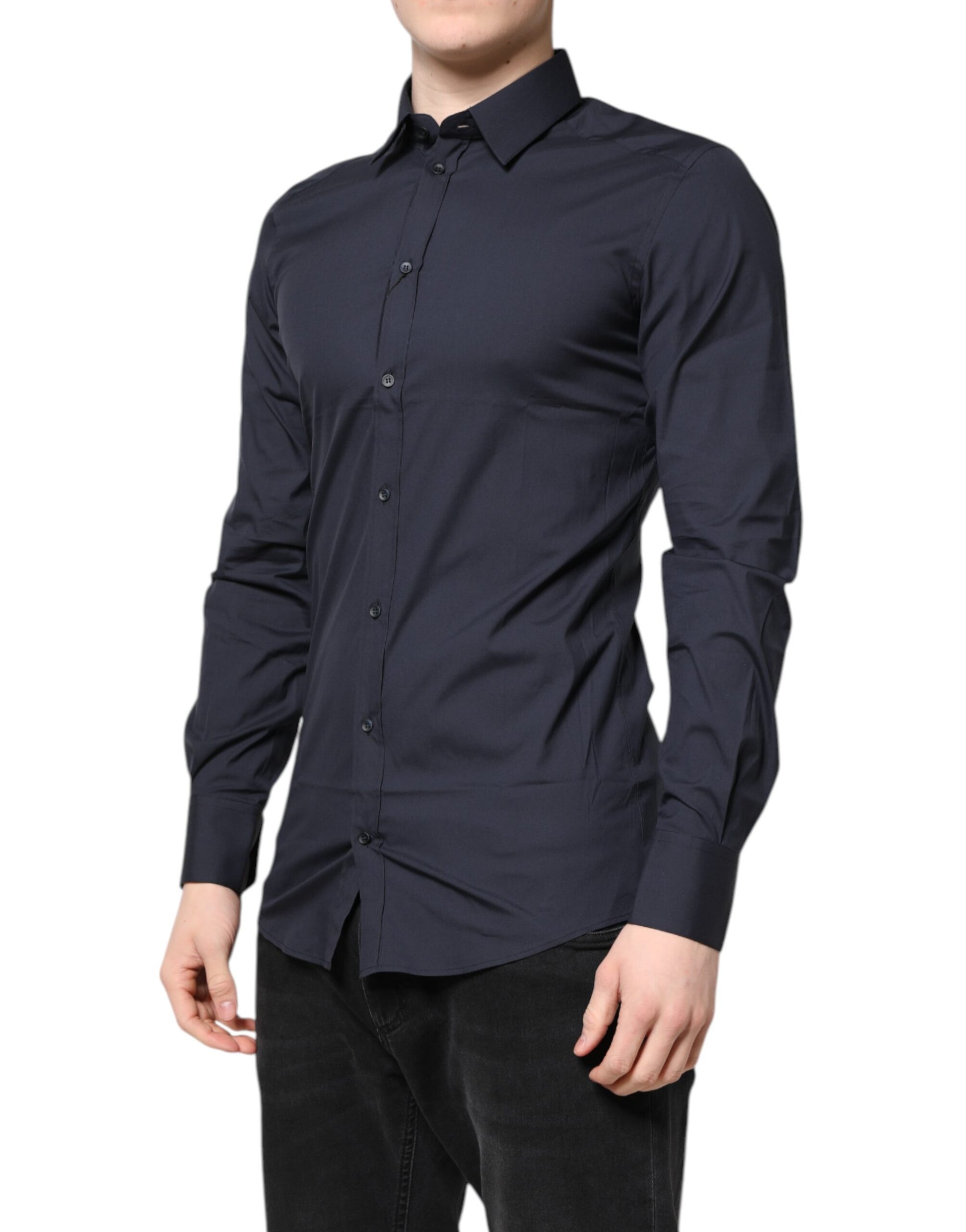 A dark blue dress shirt with gold accents, part of a formal wear collection by Dolce & Gabbana