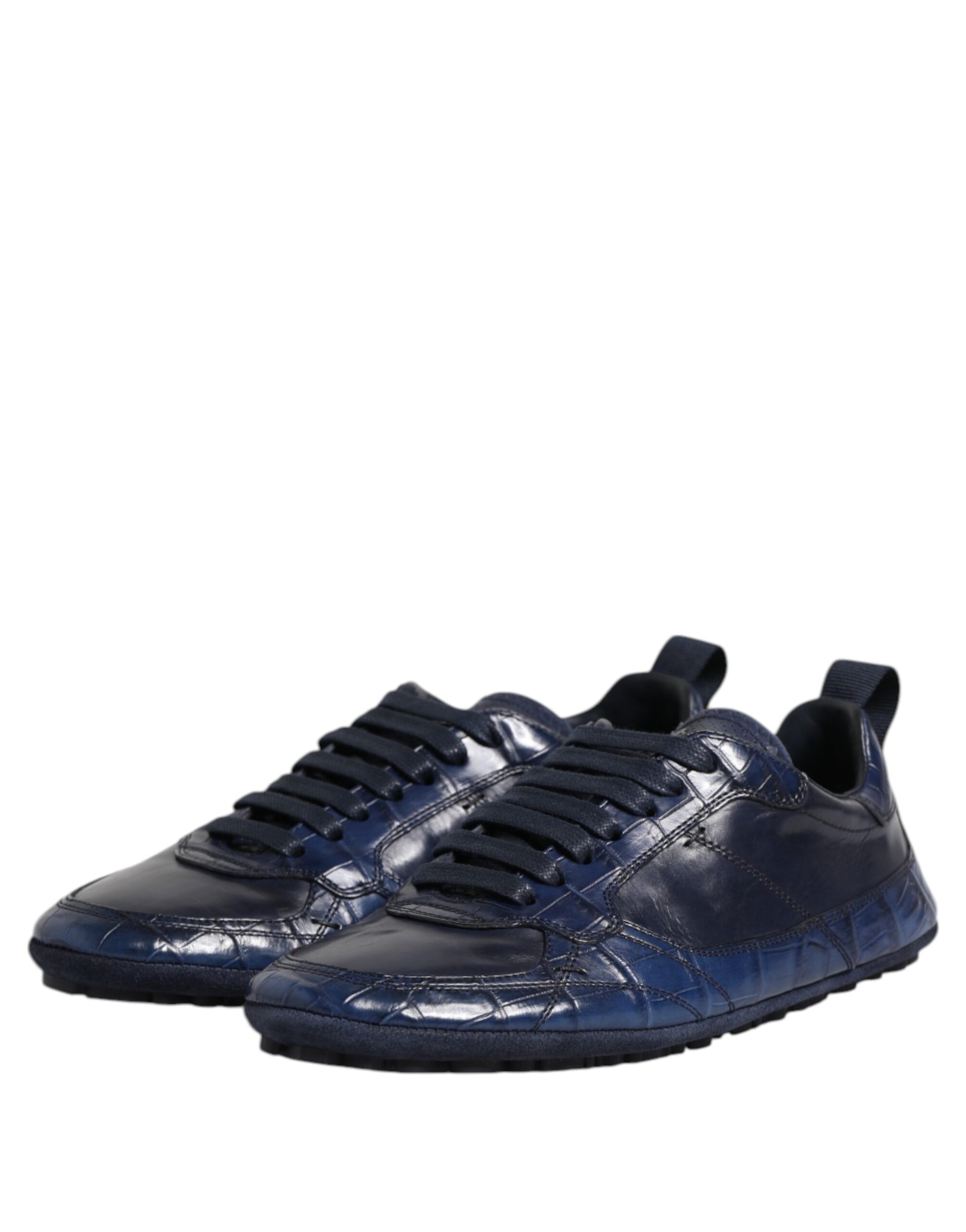 Pair of black sneakers with white laces