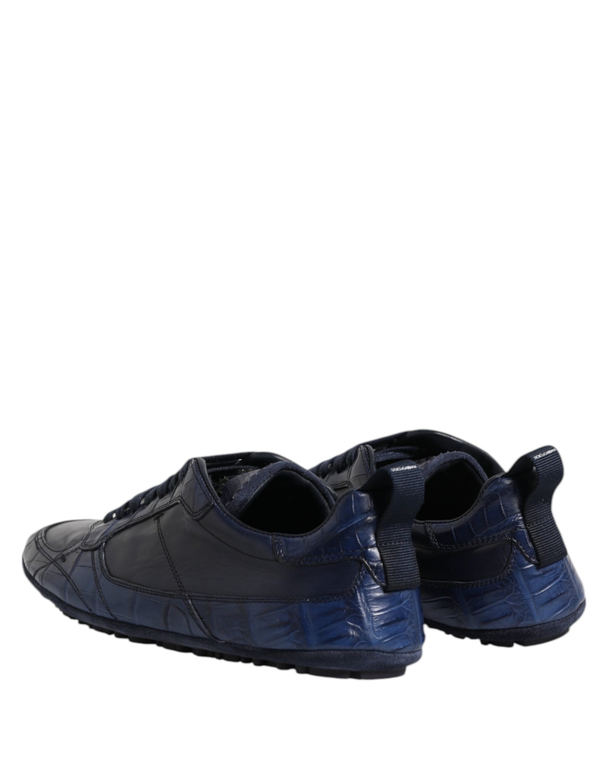Pair of black sneakers with white soles