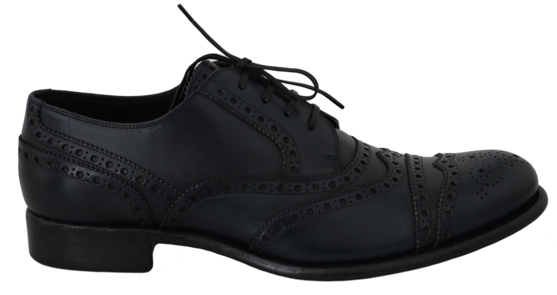 Pair of black dress shoes with laces and decorative stitching