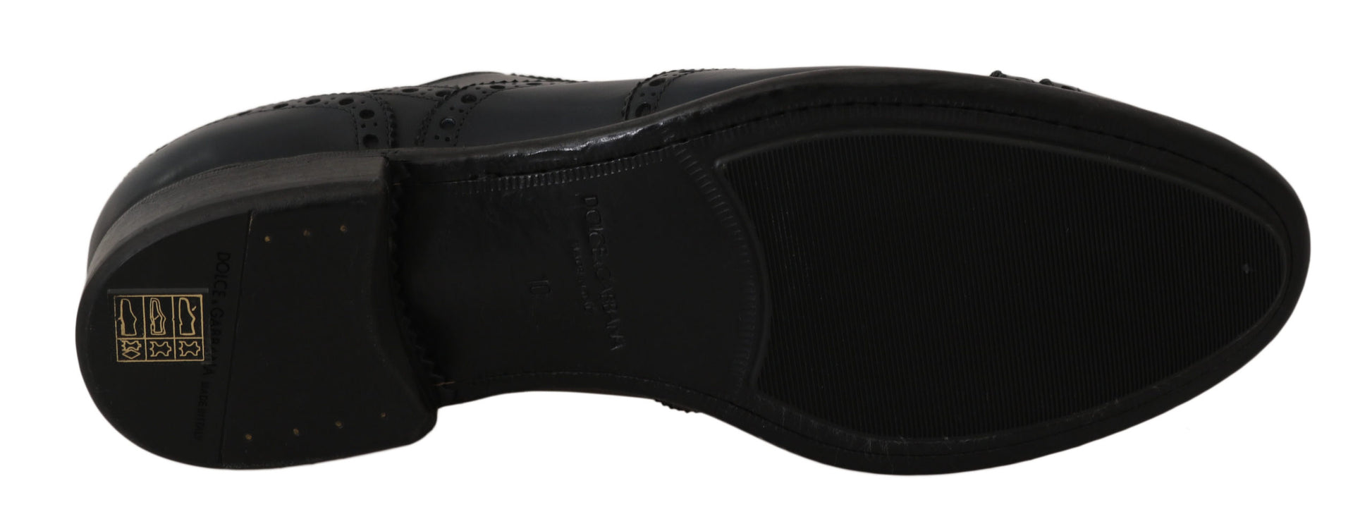 Black and white shoe with yellow logo on side