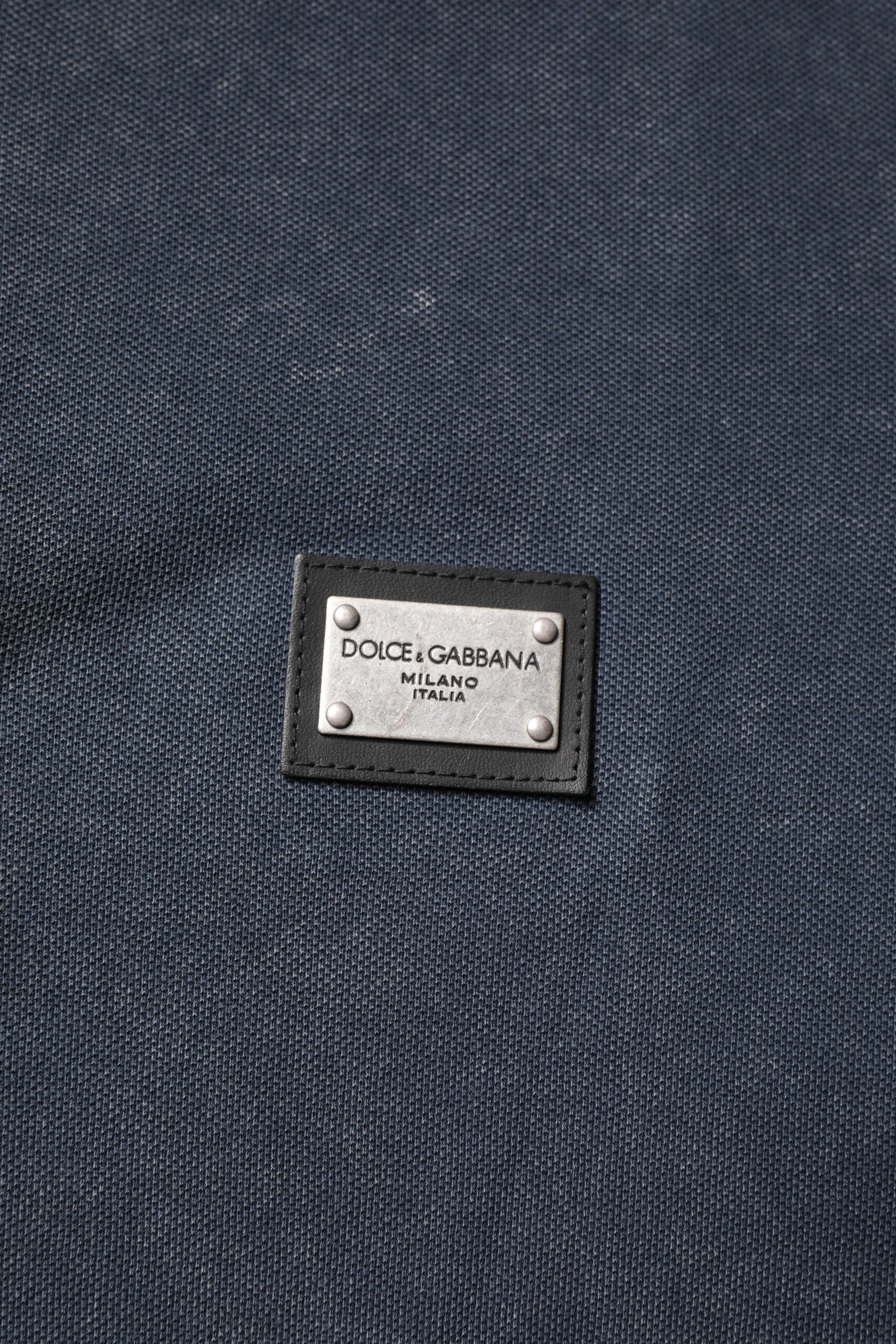 Tag on blue fabric
