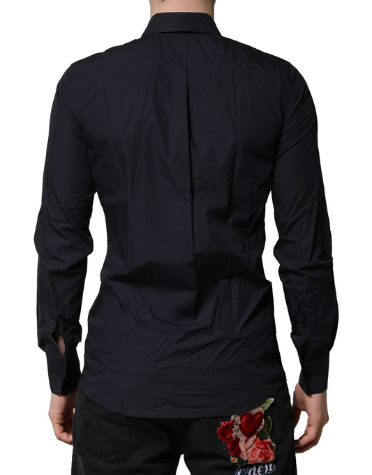 A dark blue dress shirt with a collar and long sleeves, featuring a floral embroidery on the left chest