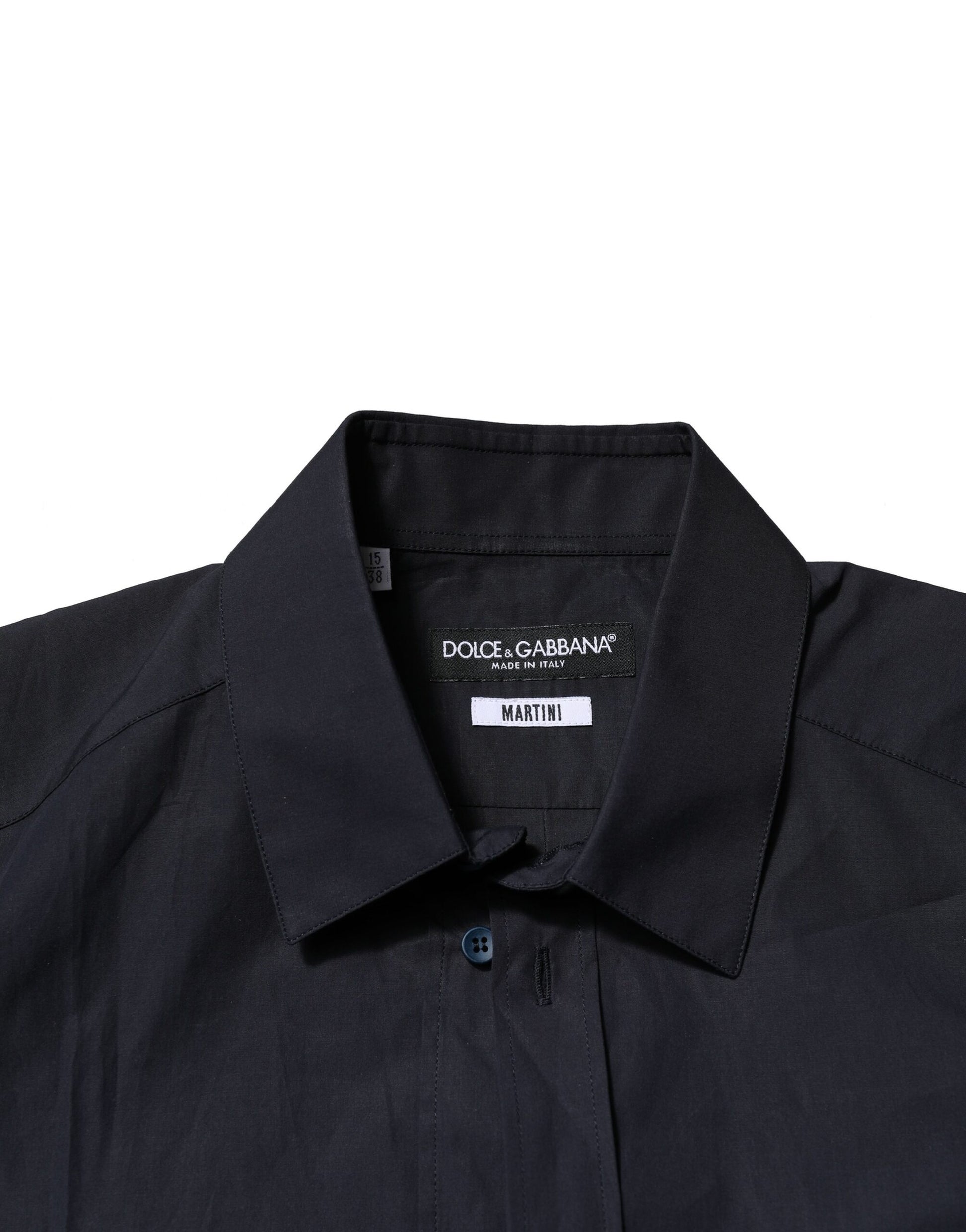 A dark blue dress shirt with a collar and buttons, from the brand Dolce & Gabbana