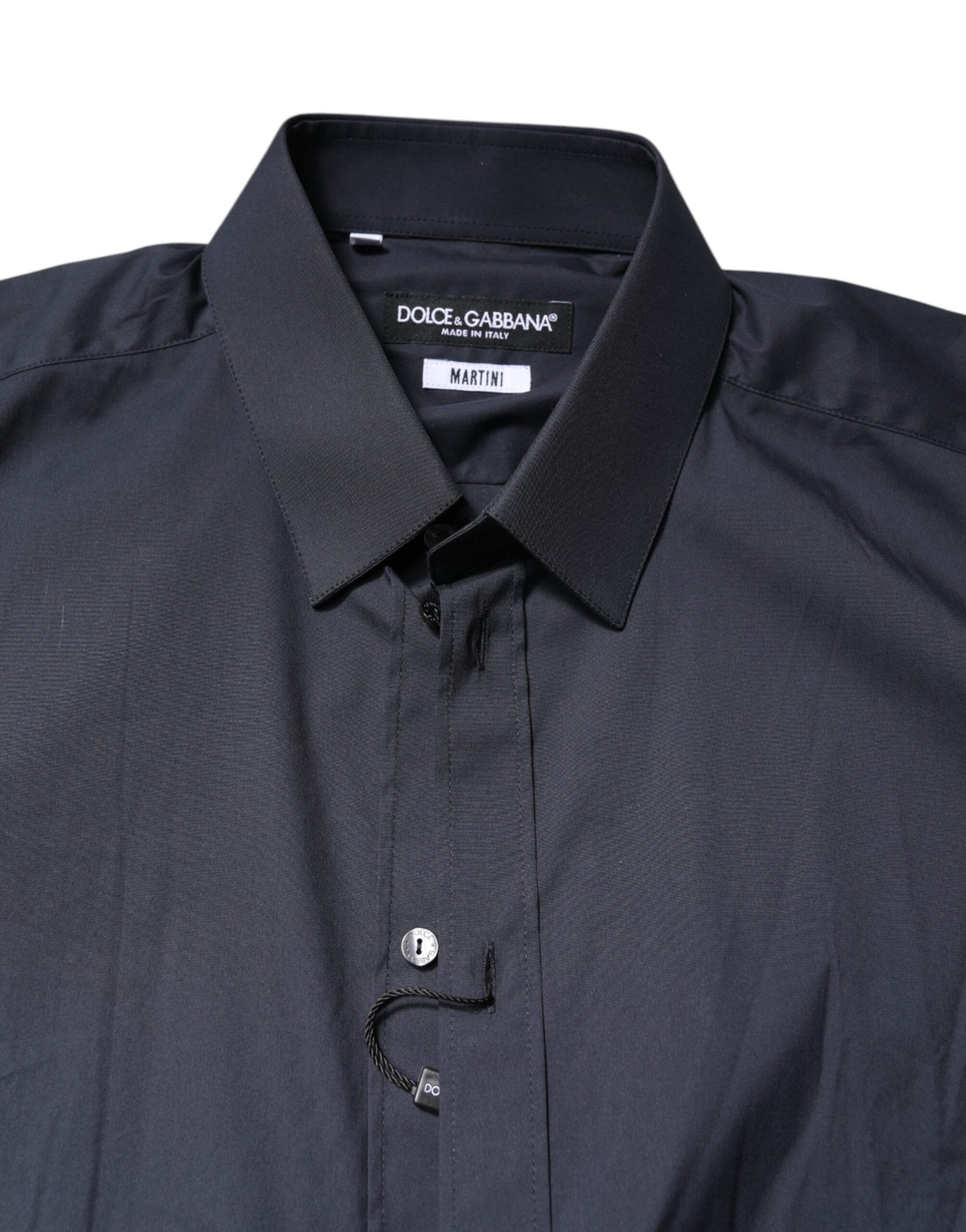 A dark blue dress shirt with a collar and button closure
