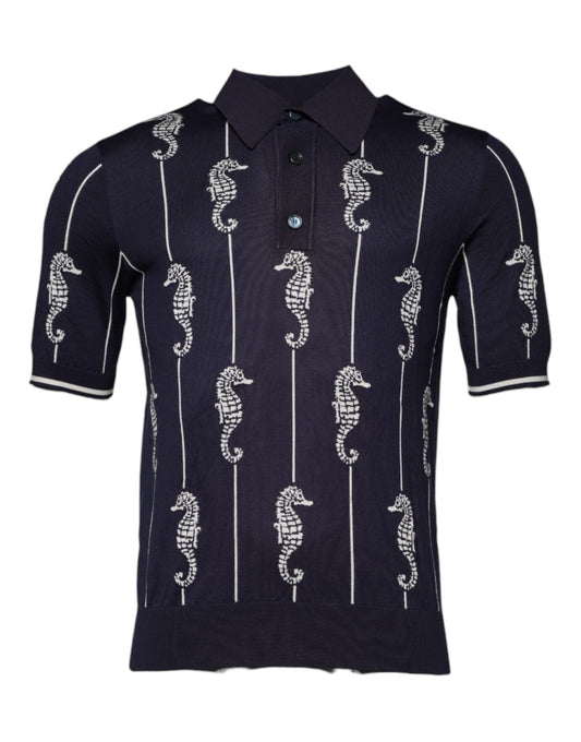 Blue polo shirt with white embroidered seahorses on sleeves