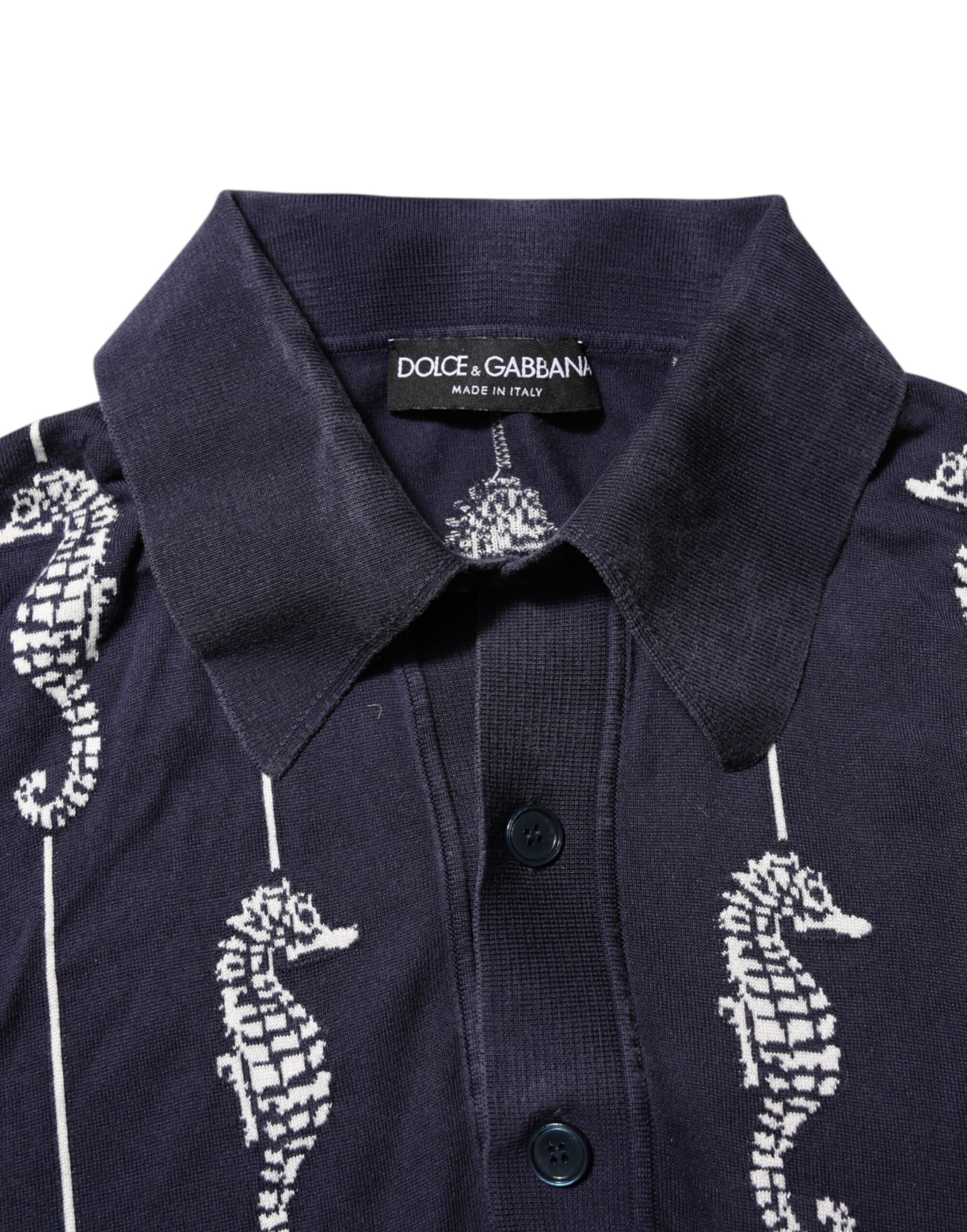 Blue shirt with white seahorse embroidery