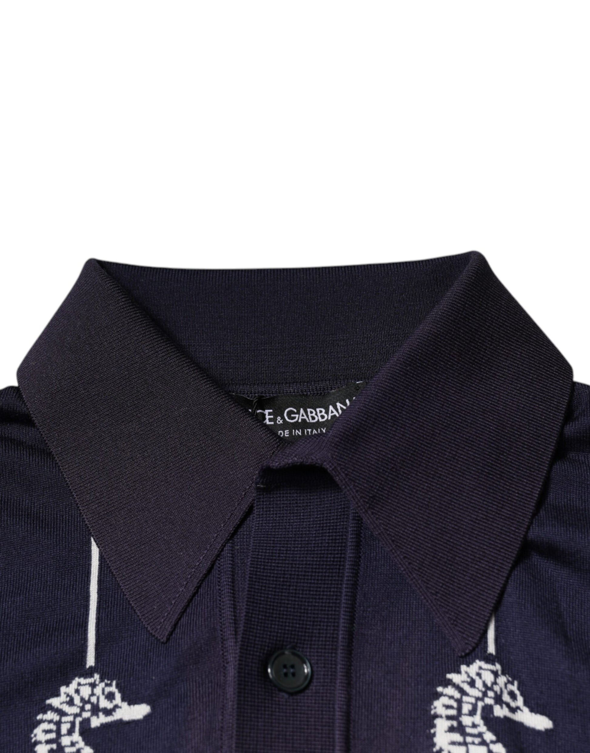 Purple polo shirt with white embroidery on collar
