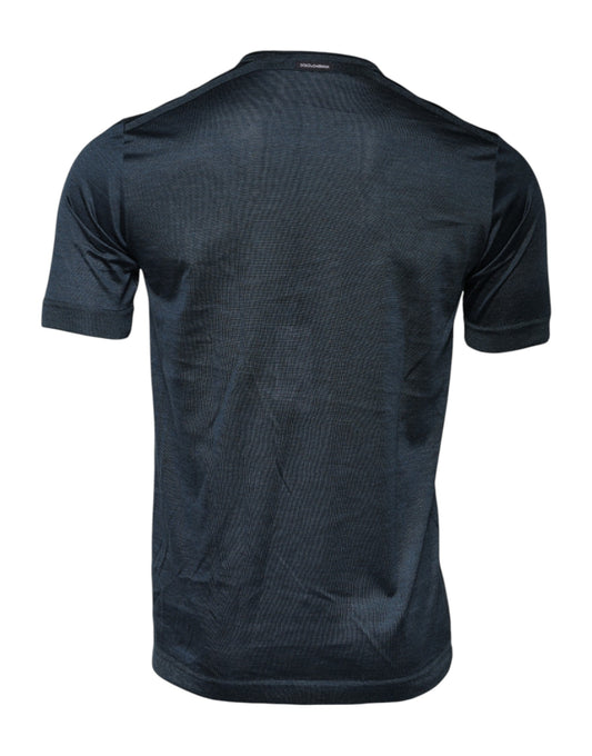 Black short sleeve shirt on a hanger