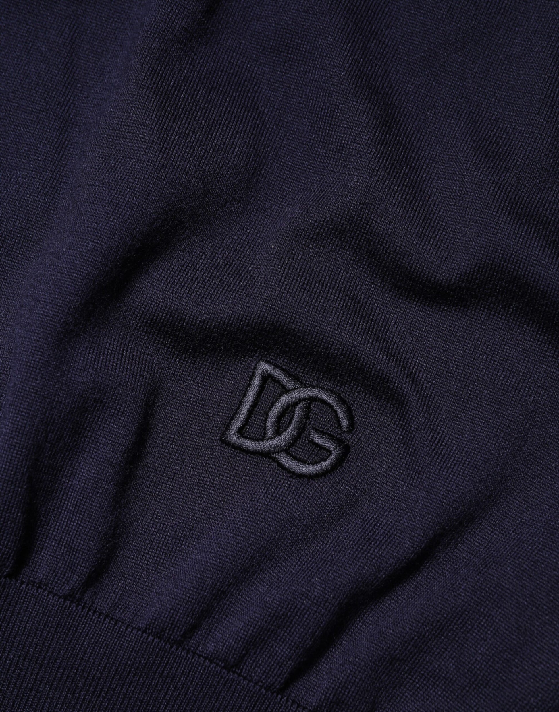 Dark blue fabric with embroidered logo
